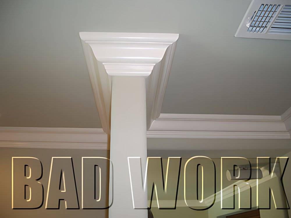 Crown molding installed with square corners instead of bull nose corners to compliment the bull nose corners of the wall